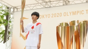Olympic Torch Relay reaches Tokyo 2020 marathon city Sapporo but event is much scaled-down