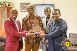 SWAG Coach of the Year (2021) Coach Ofori Asare presents his award to leadership of NSA