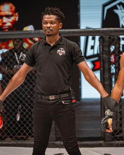 Ghana's Derrick Macaire supervises Eric Favre Nation MMA Championship in Cote d'Ivoire
