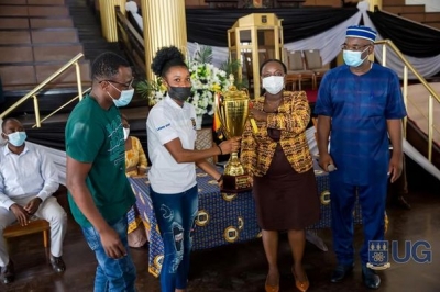 Grace Obour presents 2021 Ghana's Fastest Human Competition trophy to UG Vice-Chancellor