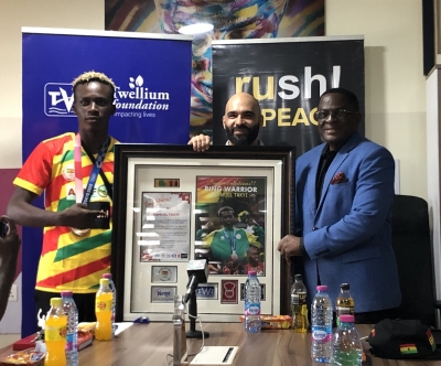Twellium Industrial Company Limited Presents Citation To Bronze medalist Samuel Takyi